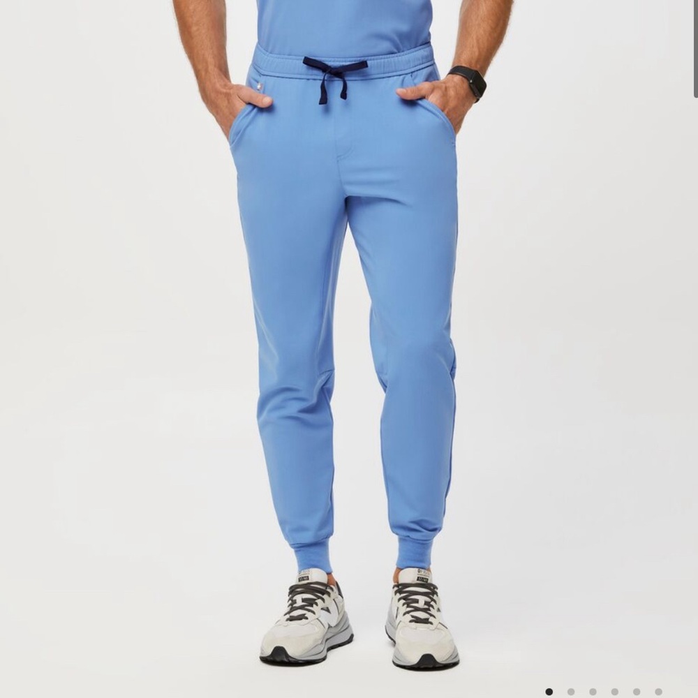 Figs Light blue scrub bottoms. Size medium